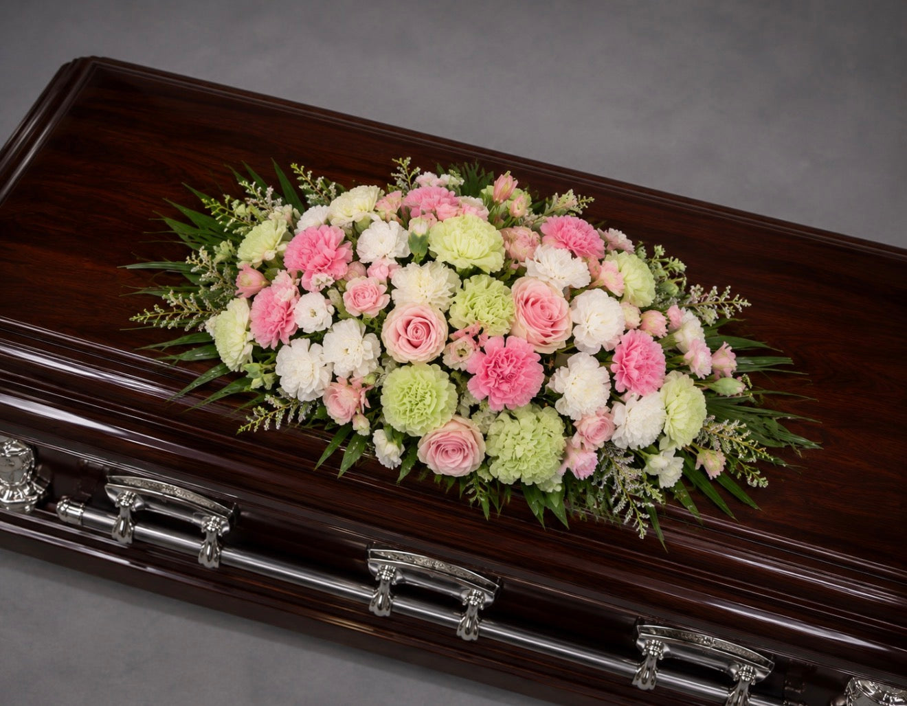 Tender Embrace Casket Spray